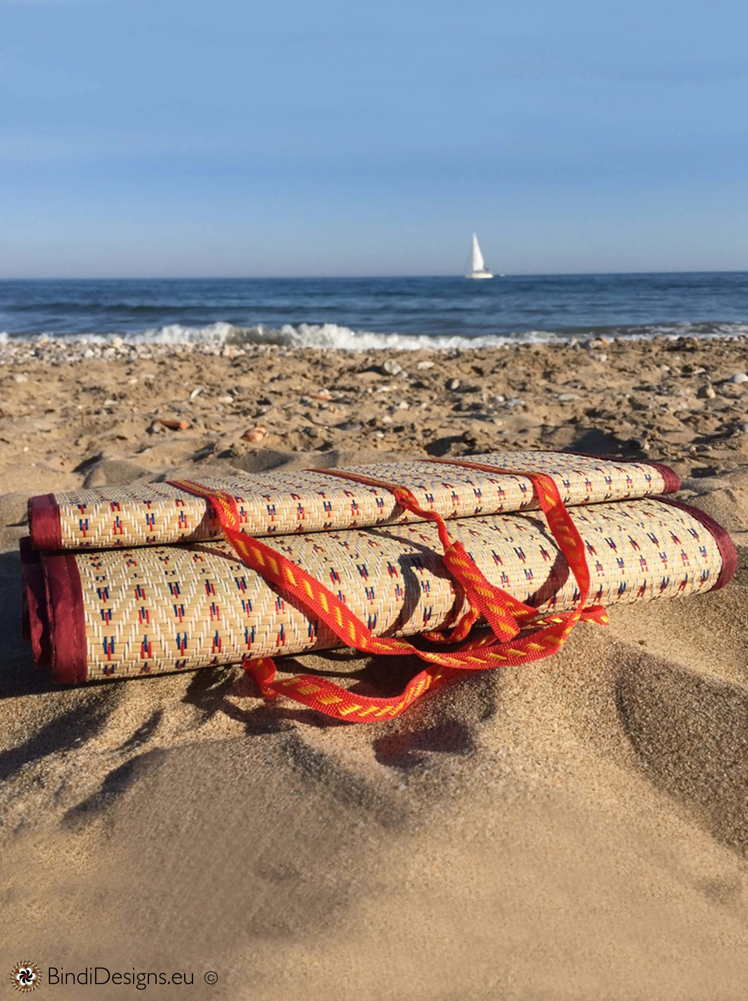 Handwoven Natural Reed Fold up Mat with Dark Red Trim