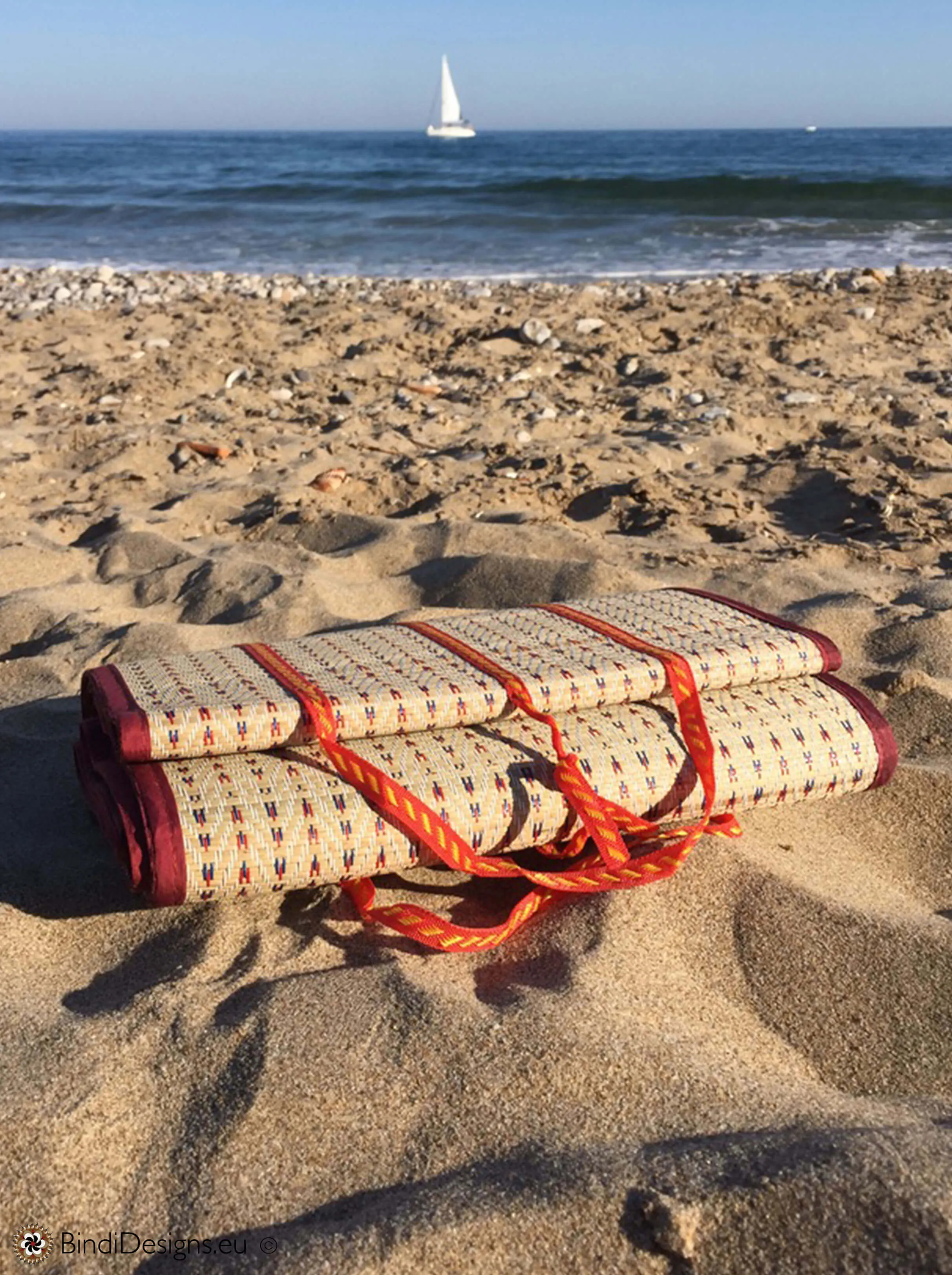 Handwoven Natural Reed Fold up Mat with Dark Red Trim